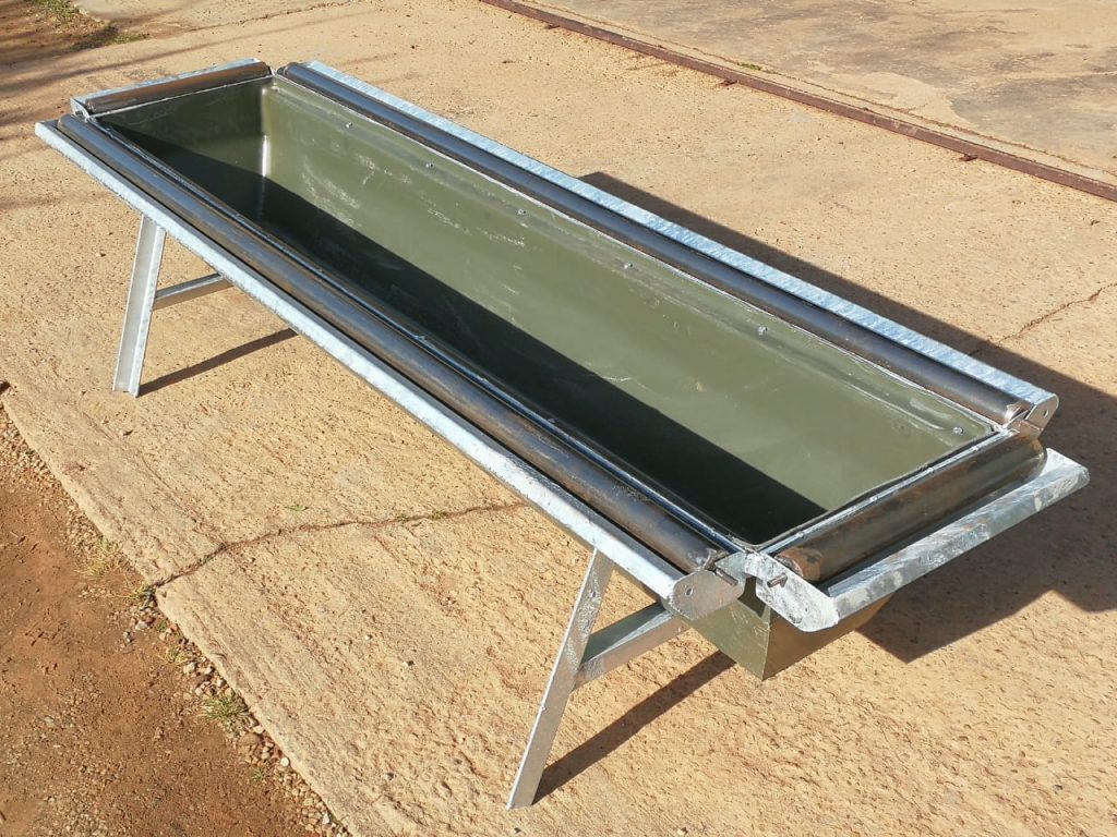 calf feeding trough with dip rollers